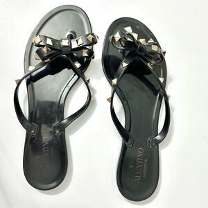 Valentino Garavani Black Jelly Bow Sandals with Gold Studs